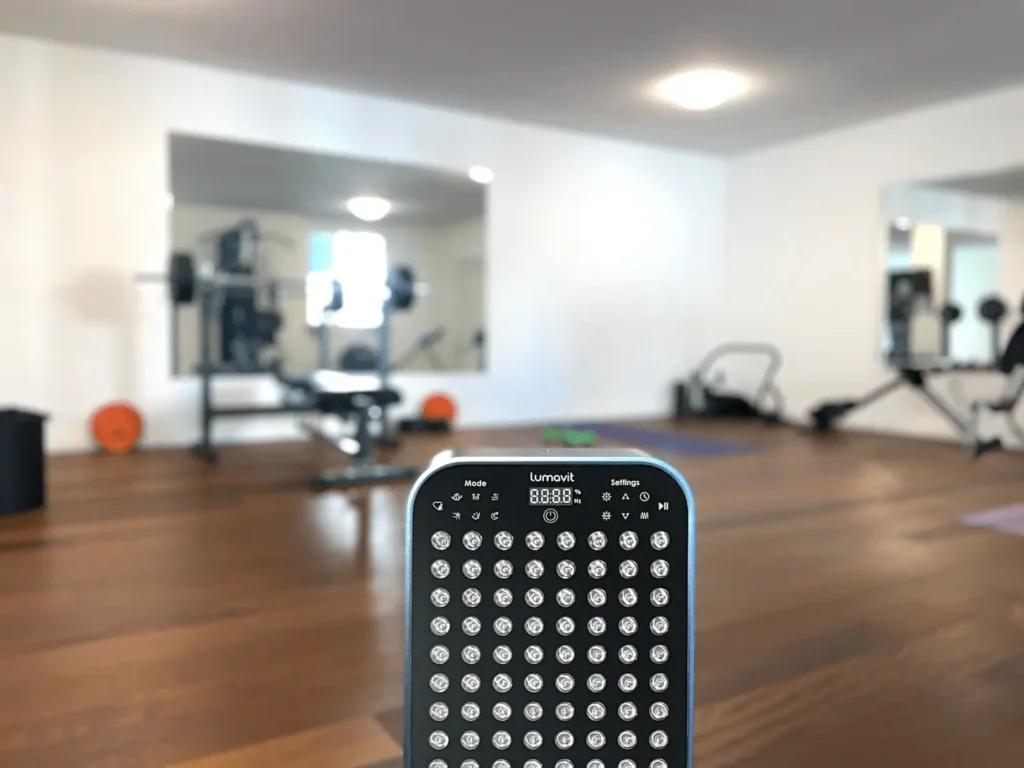 closeup shot of a Lumavit home device standing in a gym
